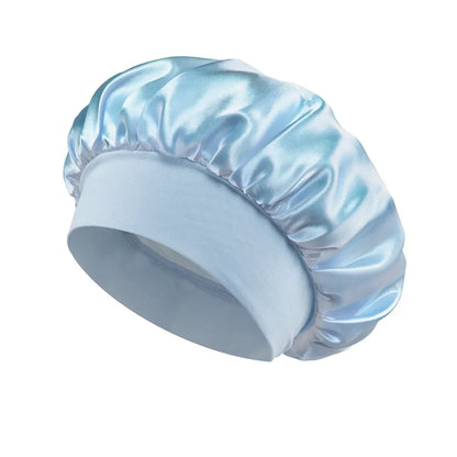 Light blue Women Satin Bonnet Hair Bonnet for Sleeping Hair Care Silk Bonnets Solid Wide-brimmed Sleeping Hat with Elastic Soft Band made of smooth, shiny satin material for gentle hair protection.