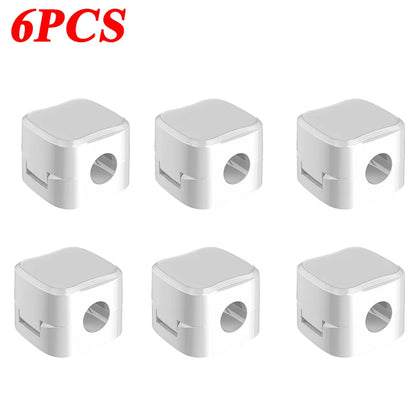 Set of six white Magnetic Cable Clip Cable Holder Adhesive Wire Keeper Cord Cable Organizer for Home Office Under Desk Management pieces for neat electronic wire arrangement.