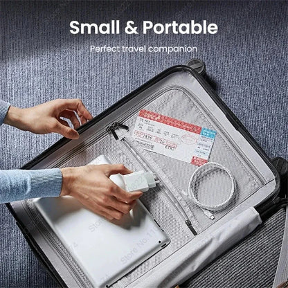 PD 40W Fast Charger For iPhone 14 13 12 11 15 16 Pro Max Phone Charger For iPhone 15 16 Plus USB C Cable Fast Charging Data Line shown as a small, portable travel charger being packed into a suitcase.