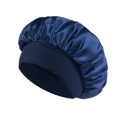 Women Satin Bonnet Hair Bonnet for Sleeping Hair Care Silk Bonnets Solid Wide-brimmed Sleeping Hat with Elastic Soft Band in smooth navy blue satin for gentle hair protection during sleep.