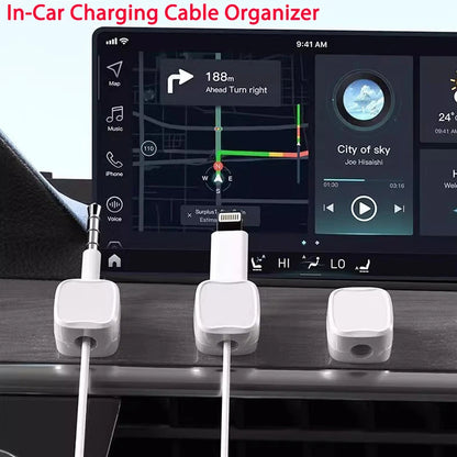 Magnetic Cable Clip Cable Holder Adhesive Wire Keeper Cord Cable Organizer for Home Office Under Desk Management securing multiple charging cables neatly on a car dashboard surface.