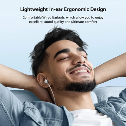 Man relaxing with eyes closed wearing For Samsung Headphones HiFi Surround Sound In-ear USB Type C 3.5mm With wire control Wired Earplugs For Galaxy S24 S23 S22 Ultra in-ear earbuds designed for comfort and superior sound quality.